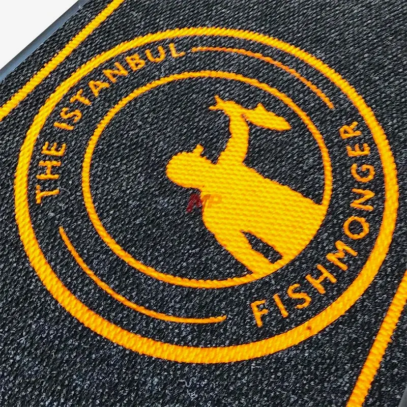 Balıkçılara Özel Çerçeveli Turuncu Siyah Logolu Paspas The Fish Balıkçılara Özel Çerçeveli Turuncu Siyah Logolu Paspas The Fish